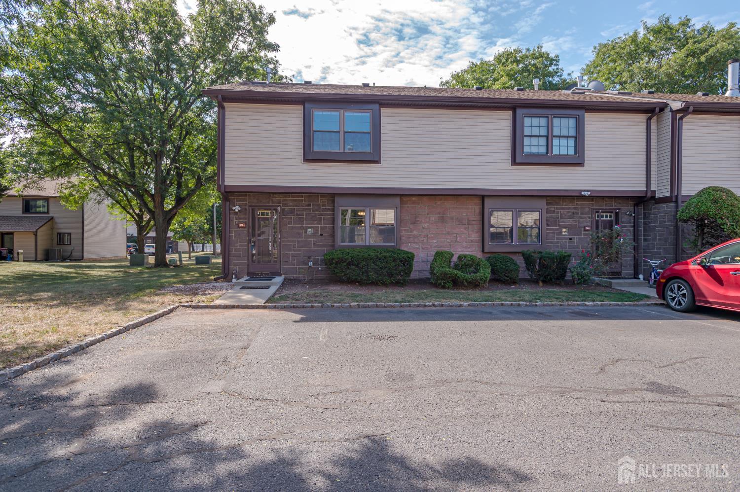 5601 Hana Road Edison, NJ 08817 - Photo 2 of 27 a view of a car parked in front of a house