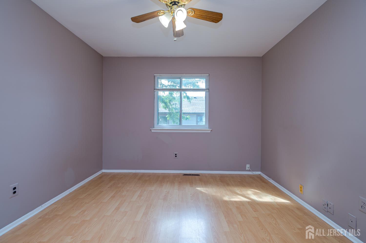 5601 Hana Road Edison, NJ 08817 - Photo 22 of 27 an empty room with a window