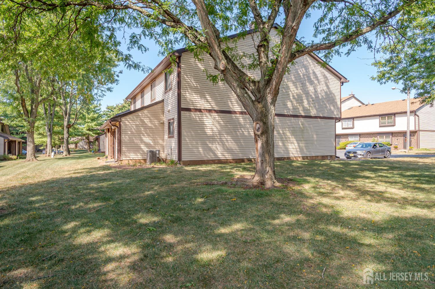 5601 Hana Road Edison, NJ 08817 - Photo 27 of 27 a backyard of a house with lots of green space