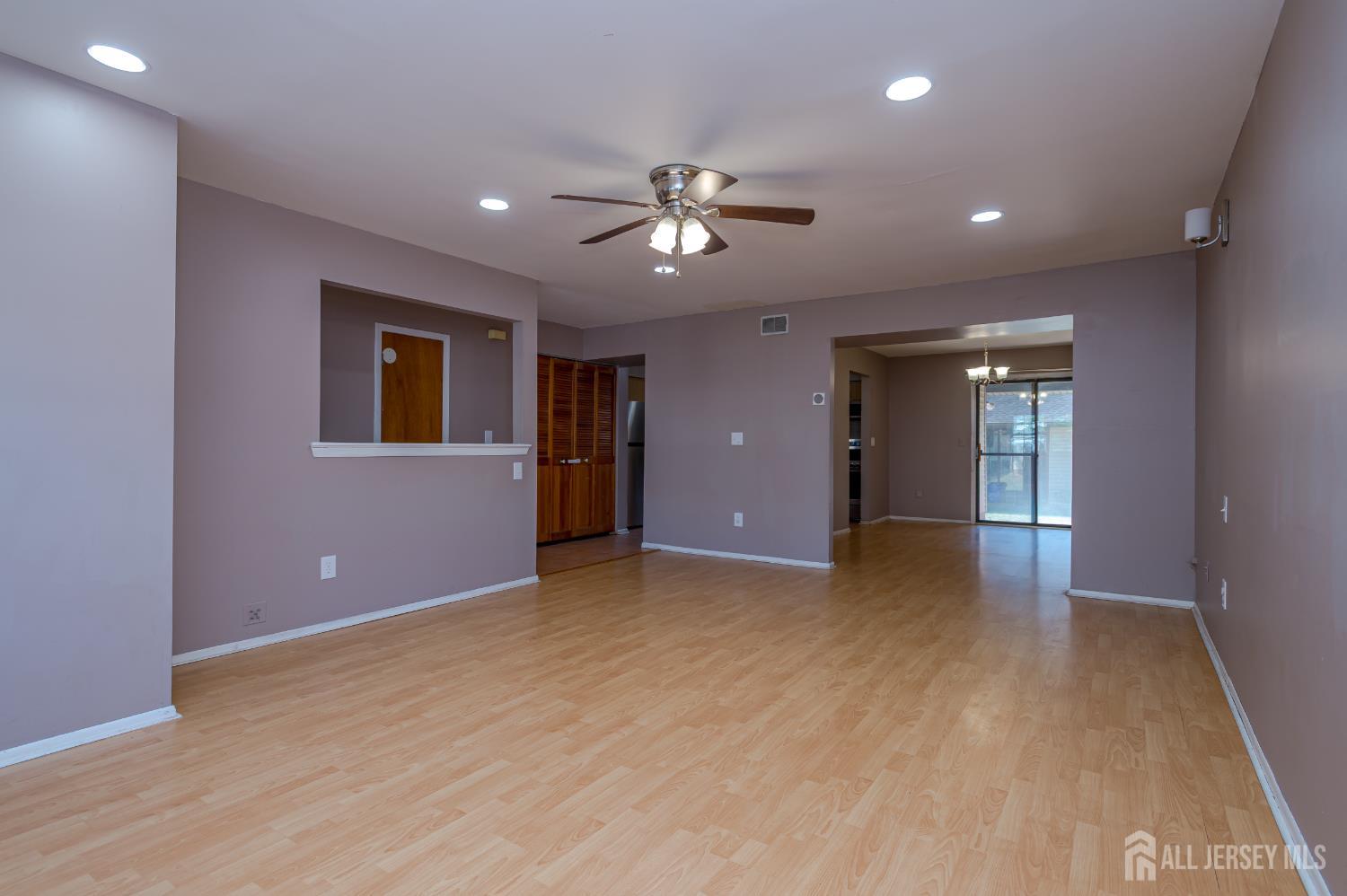 5601 Hana Road Edison, NJ 08817 - Photo 8 of 27 a view of an empty room with a window