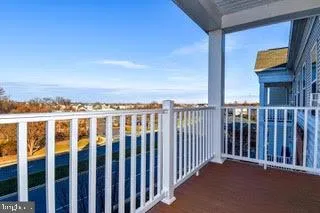 a view of a balcony with city view
