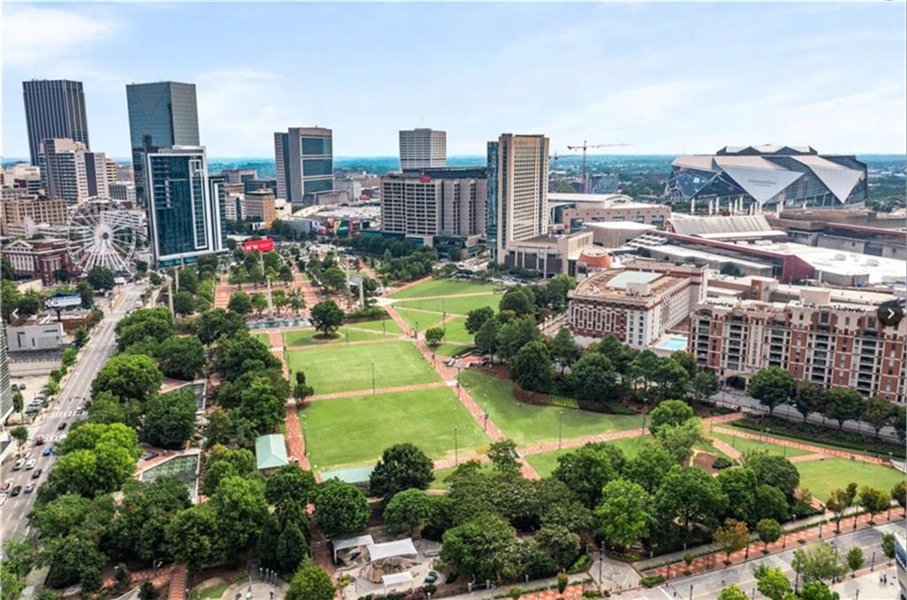 285 Centennial Olympic Park Drive Northwest, Unit 1209 Atlanta, GA 30313 - Photo 17 of 17 a view of a city with tall buildings