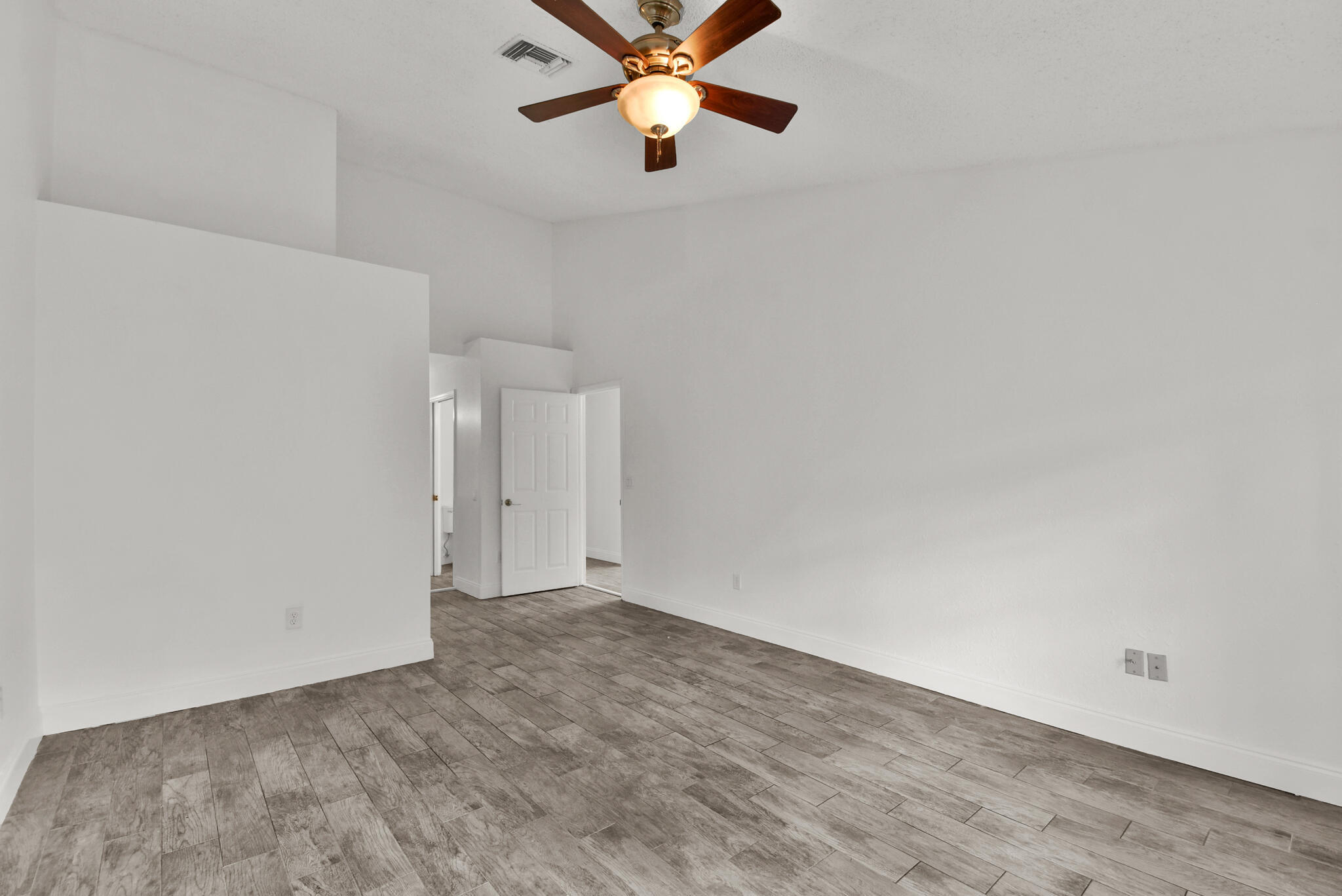 13175 Quiet Woods Road, Unit A Wellington, FL 33414 - Photo 12 of 46 a view of an empty room