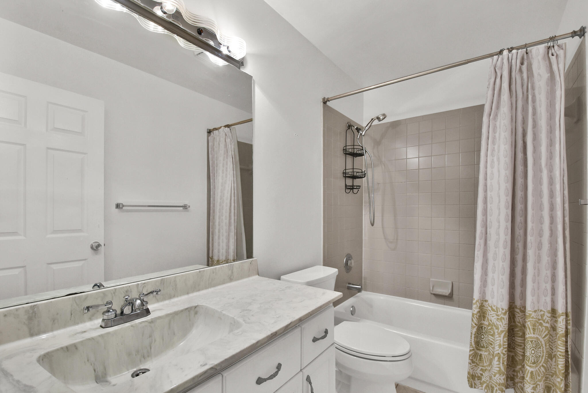 13175 Quiet Woods Road, Unit A Wellington, FL 33414 - Photo 26 of 46 a bathroom with a sink a toilet and shower