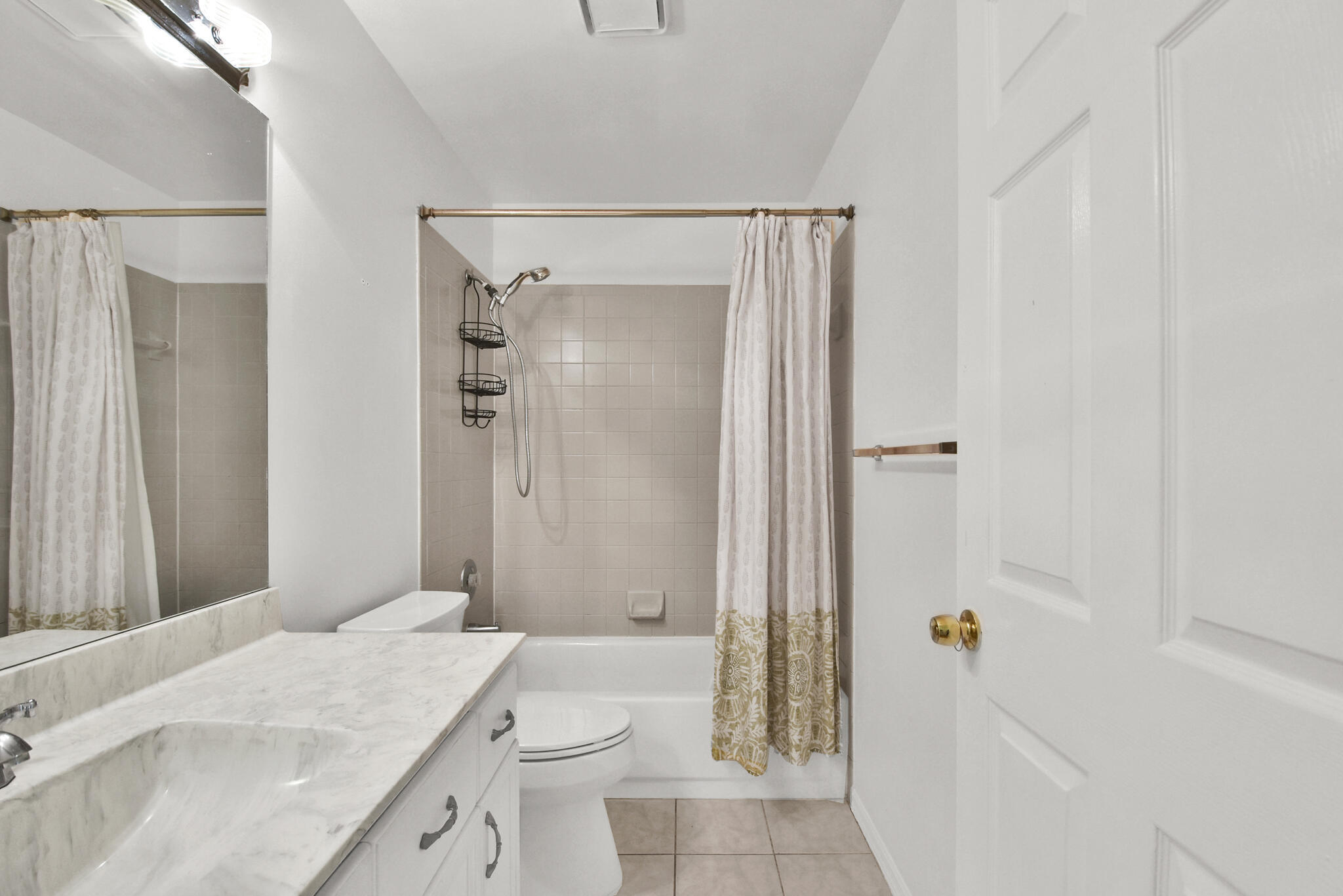 13175 Quiet Woods Road, Unit A Wellington, FL 33414 - Photo 27 of 46 a bathroom with a granite countertop sink a toilet and shower