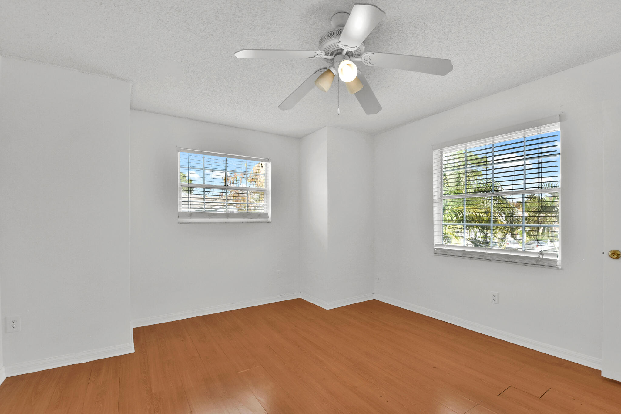 13175 Quiet Woods Road, Unit A Wellington, FL 33414 - Photo 30 of 46 a view of a big room with windows