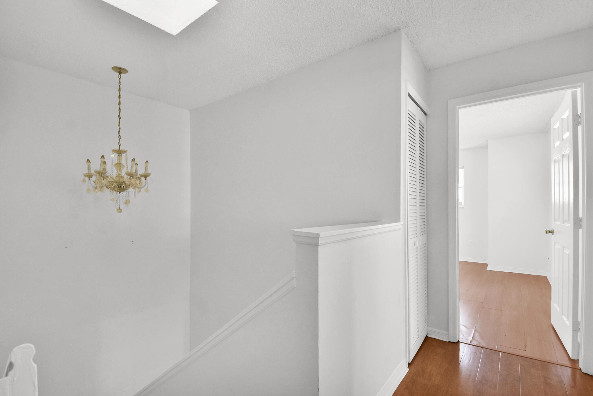 13175 Quiet Woods Road, Unit A Wellington, FL 33414 - Photo 31 of 46 a very nice looking room with a wooden floor