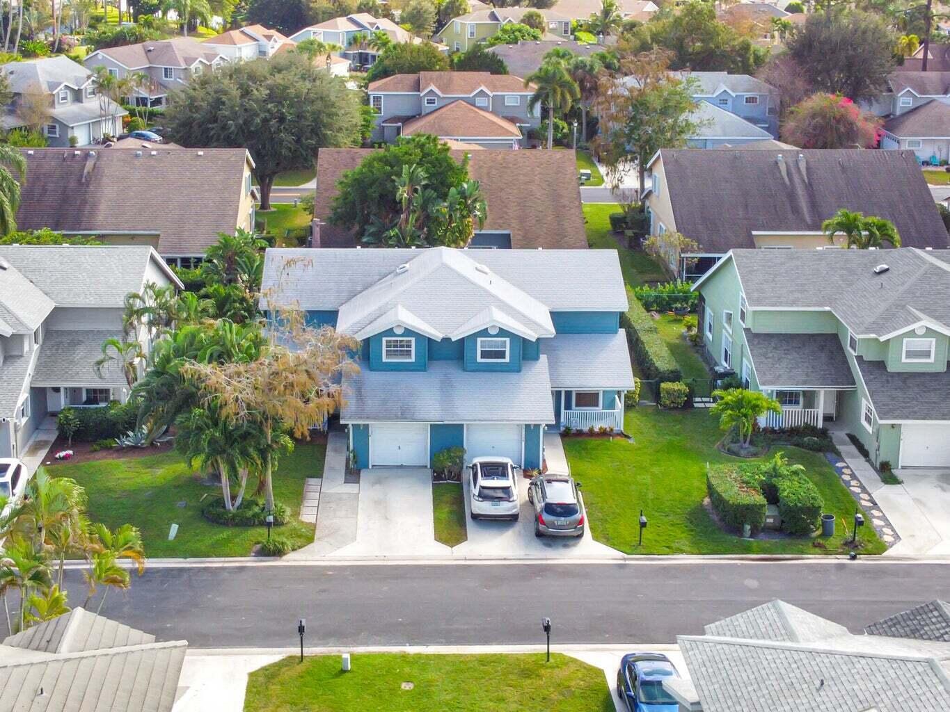 13175 Quiet Woods Road, Unit A Wellington, FL 33414 - Photo 41 of 46 an aerial view of a house