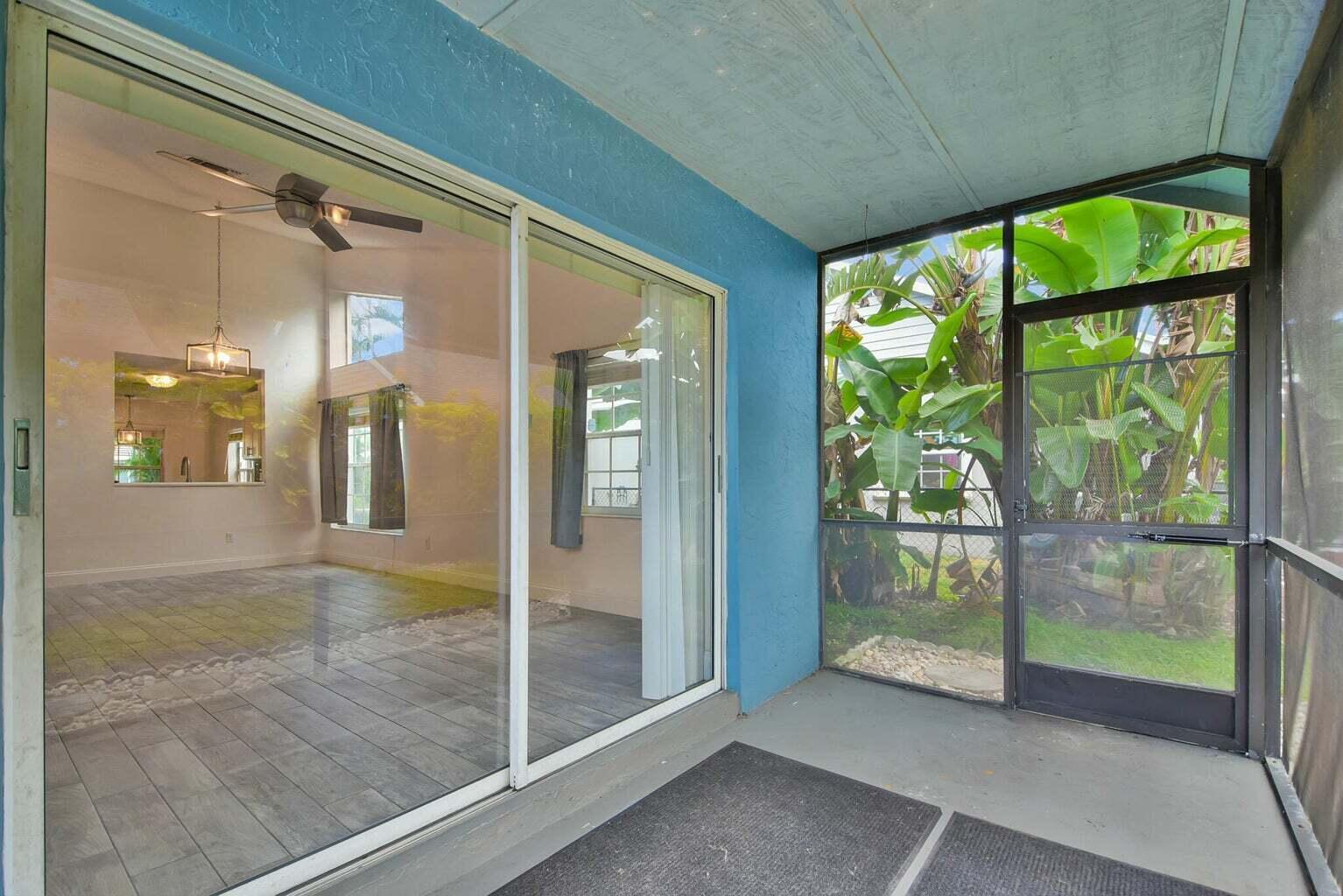 13175 Quiet Woods Road, Unit A Wellington, FL 33414 - Photo 45 of 46 a view of a room with a large window