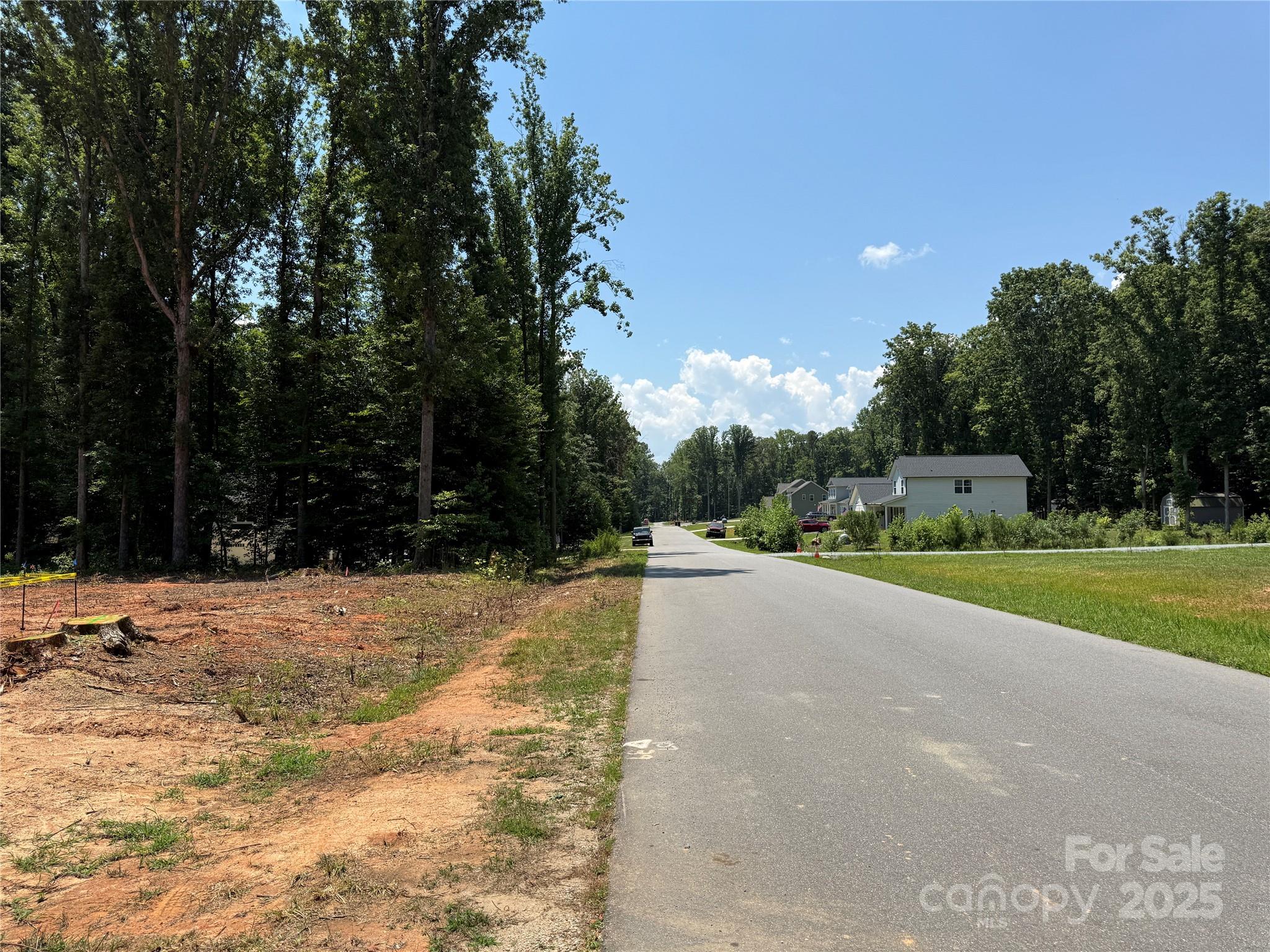 219 Barra Drive, Unit 4 Waxhaw, NC 28173 - Photo 12 of 23 a swimming pool with yard