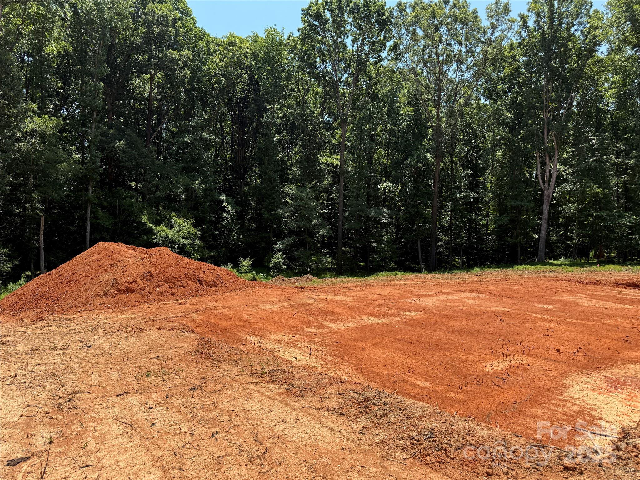 219 Barra Drive, Unit 4 Waxhaw, NC 28173 - Photo 18 of 23 a view of white and green yard