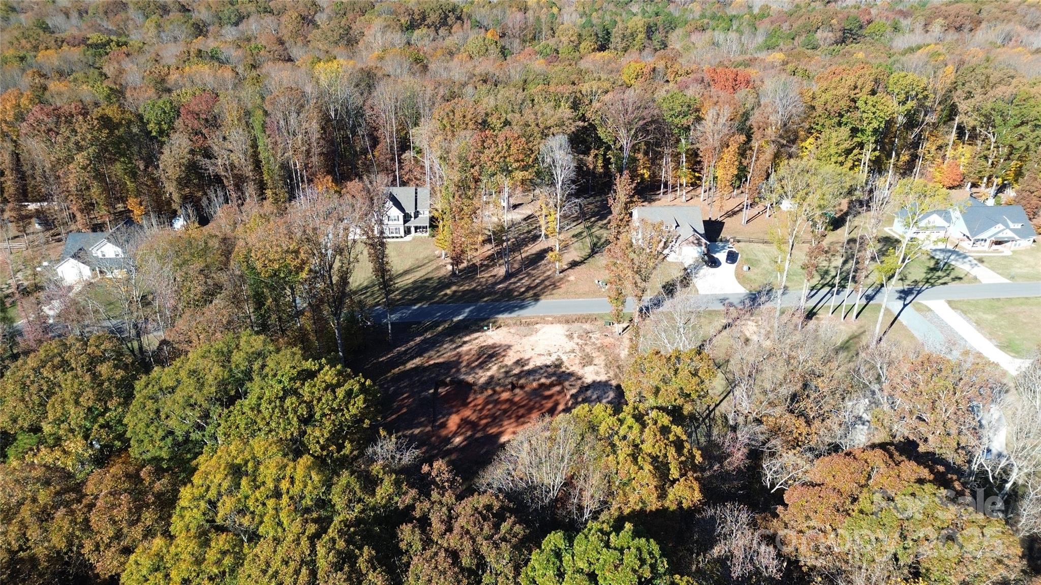 219 Barra Drive, Unit 4 Waxhaw, NC 28173 - Photo 7 of 23 a view of a tree in a yard