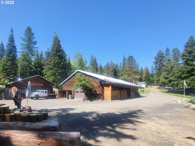 a view of house with outdoor space and street view