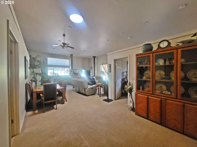 a view of a livingroom with furniture and windows