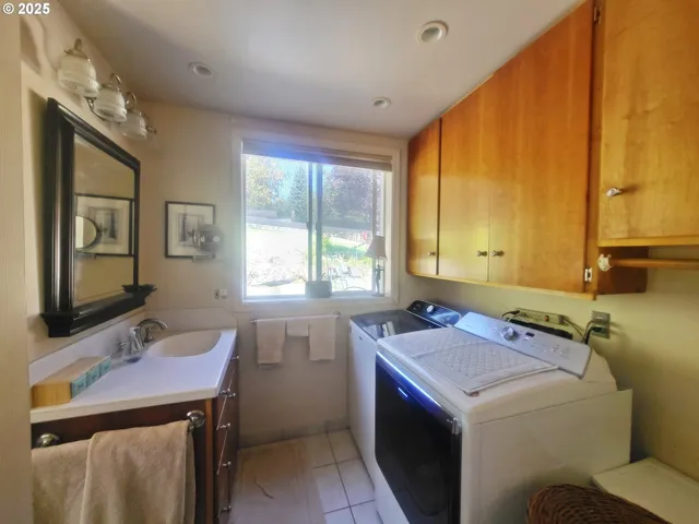 a view of a kitchen with a stove top oven