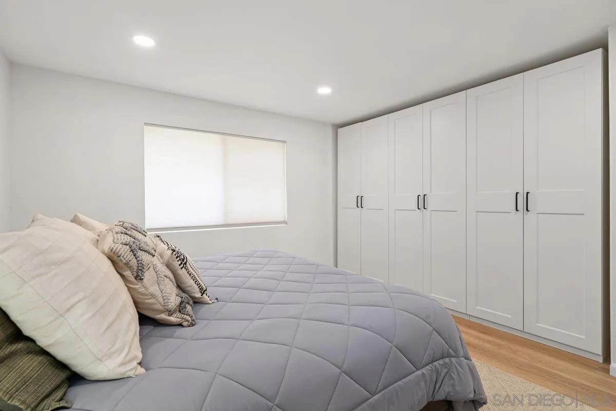 751 Pyramid Point Way Oceanside, CA 92058 - Photo 16 of 30 a bedroom with a bed and a window