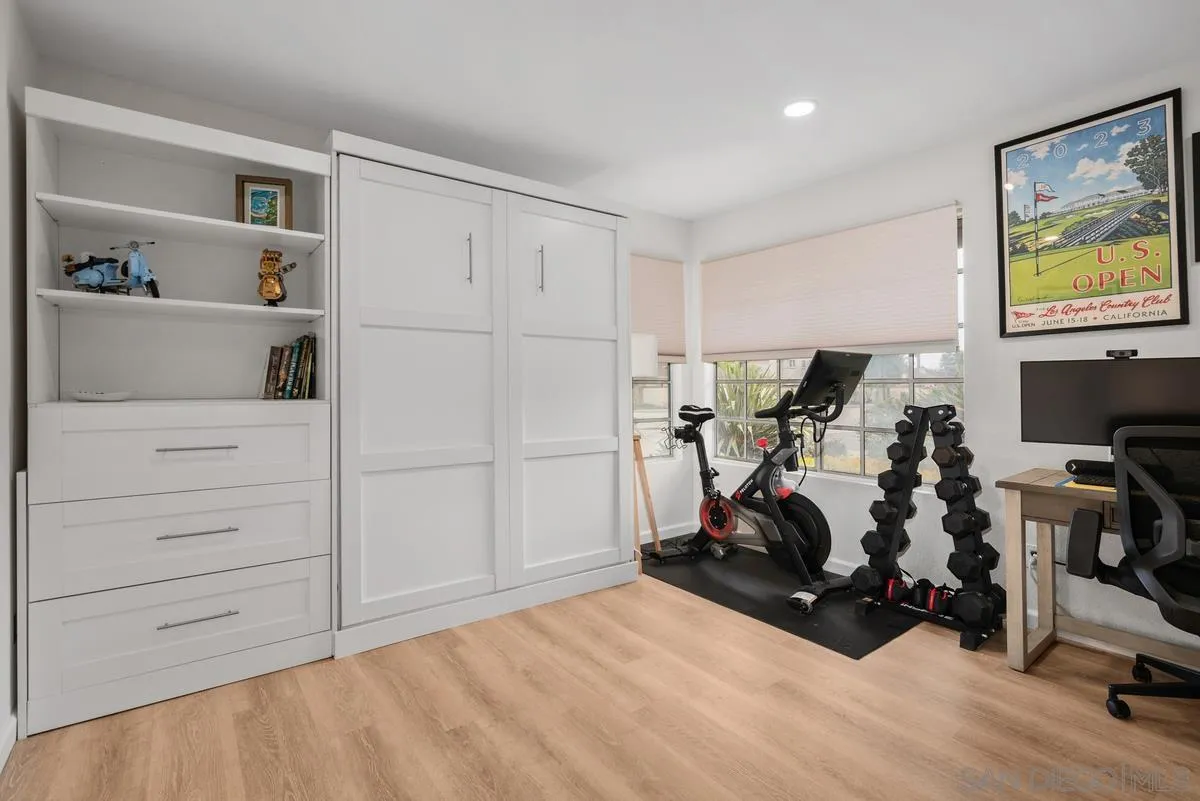 751 Pyramid Point Way Oceanside, CA 92058 - Photo 20 of 30 a view of a workspace with furniture and a window