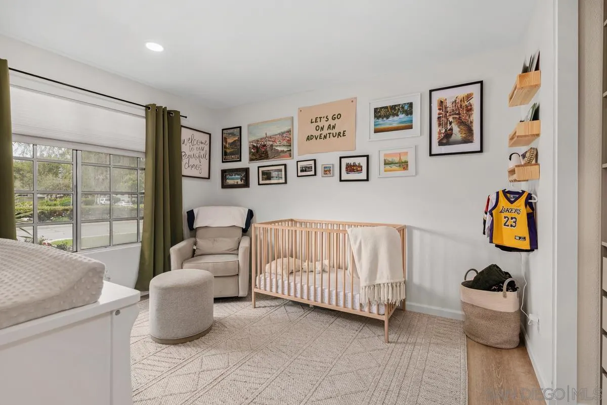 751 Pyramid Point Way Oceanside, CA 92058 - Photo 21 of 30 a bedroom with furniture and a window