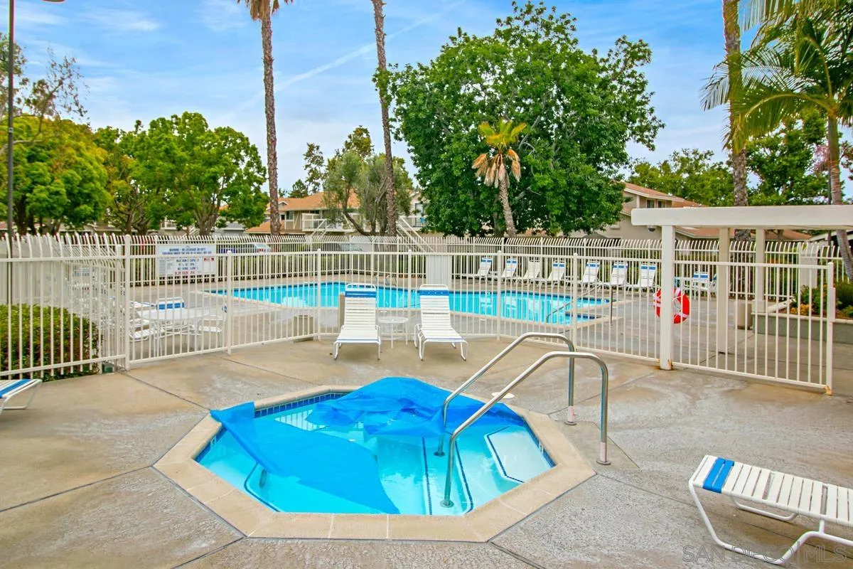 751 Pyramid Point Way Oceanside, CA 92058 - Photo 26 of 30 a view of a swimming pool with a patio and a garden