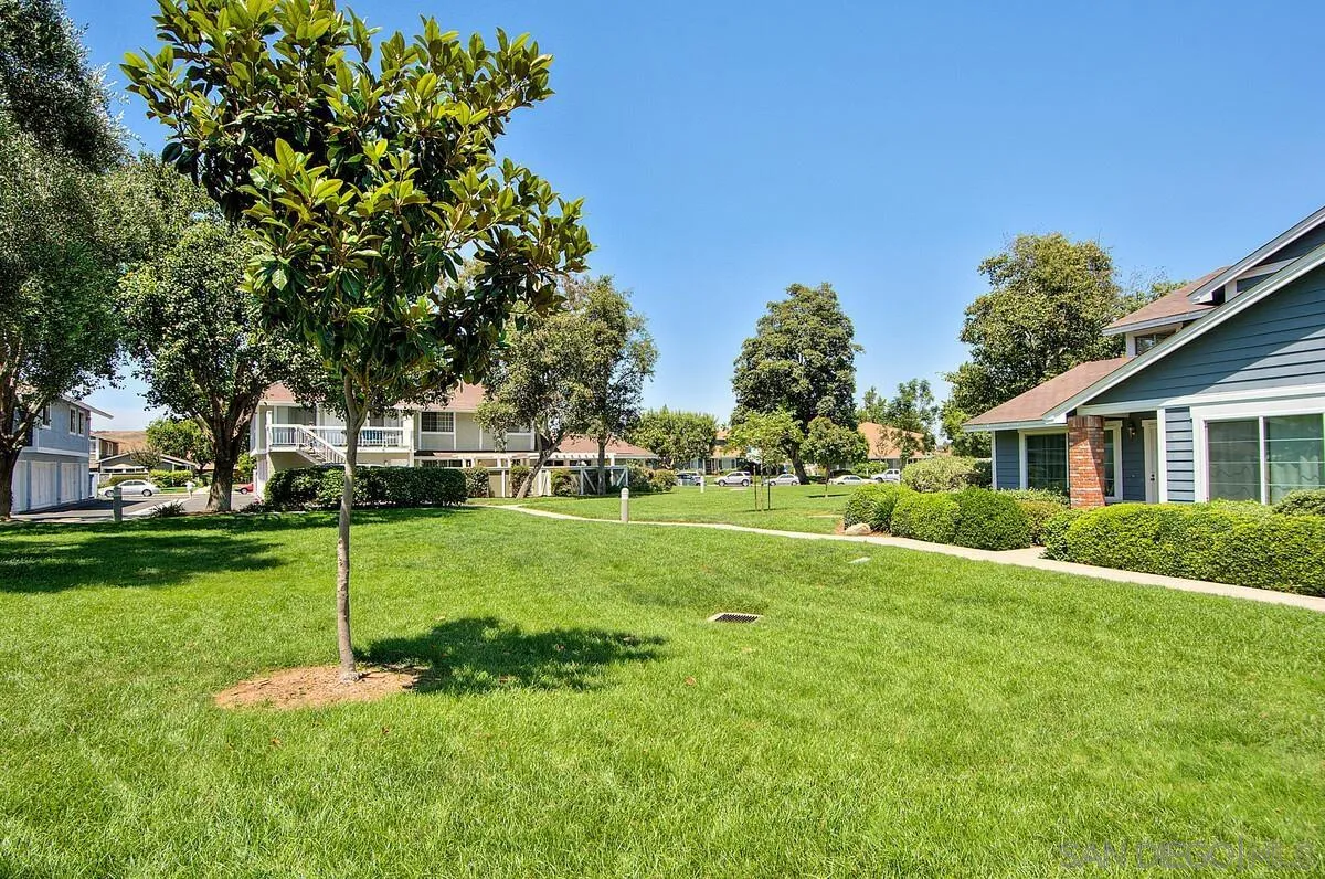 751 Pyramid Point Way Oceanside, CA 92058 - Photo 30 of 30 a view of a house with a back yard