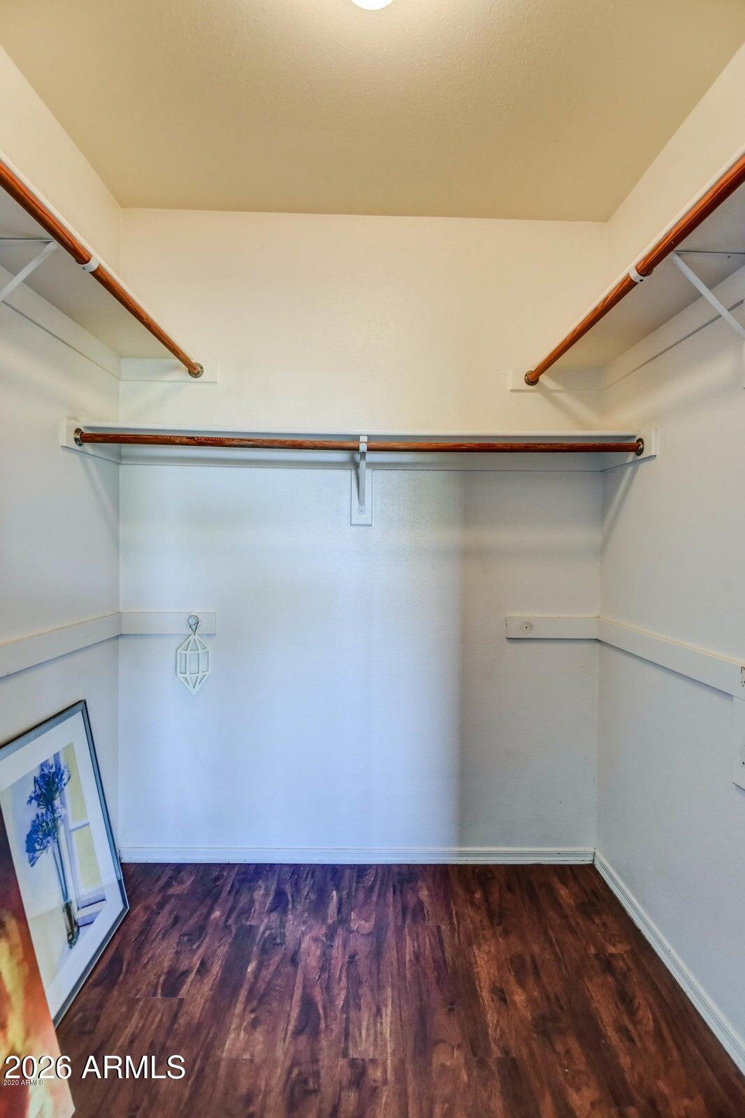 2134 East Broadway Road, Unit 1039 Tempe, AZ 85282 - Photo 18 of 24 a view of a room with wooden floor