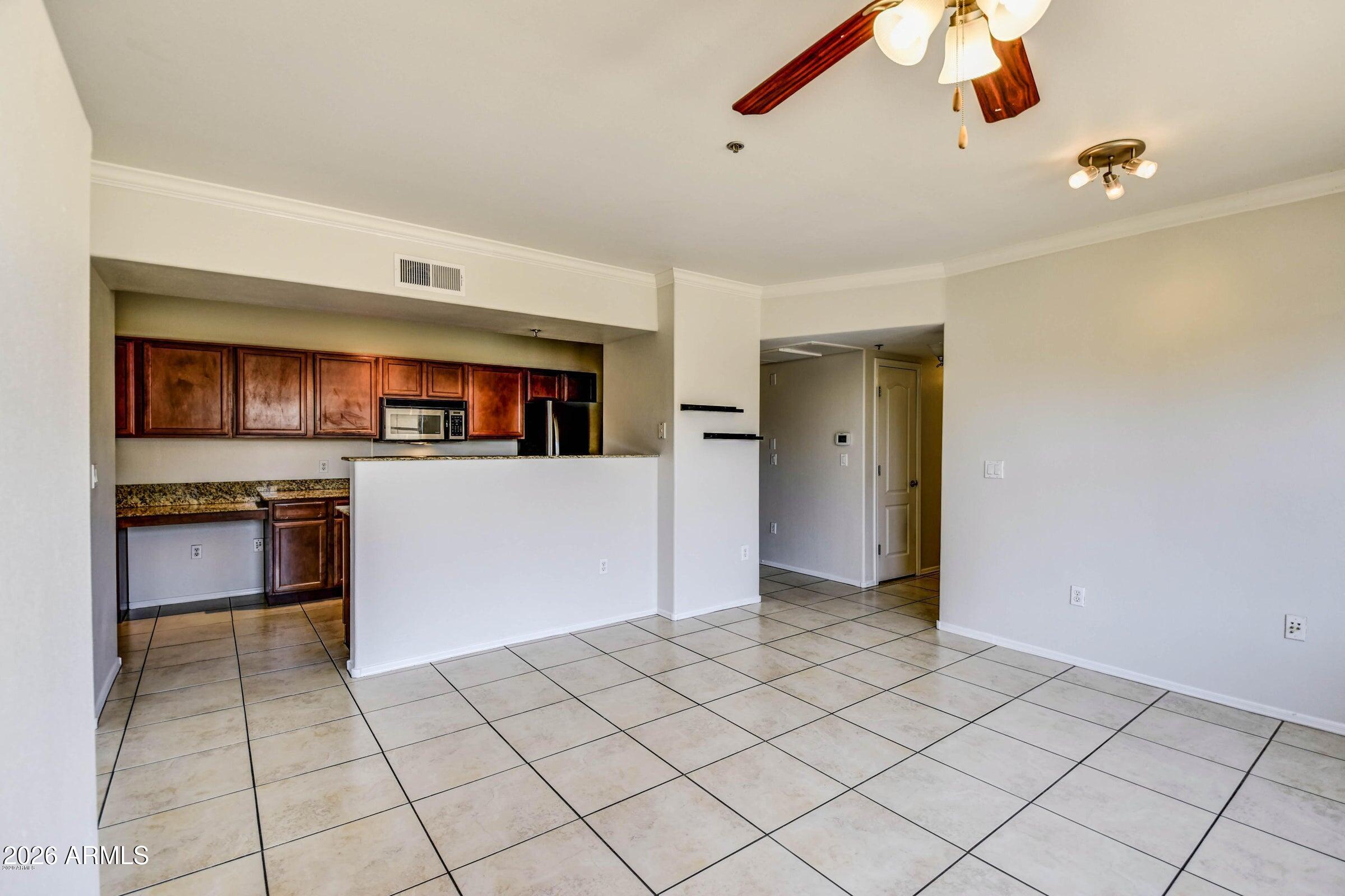 2134 East Broadway Road, Unit 1039 Tempe, AZ 85282 - Photo 6 of 24 a view interior of a house and natural light