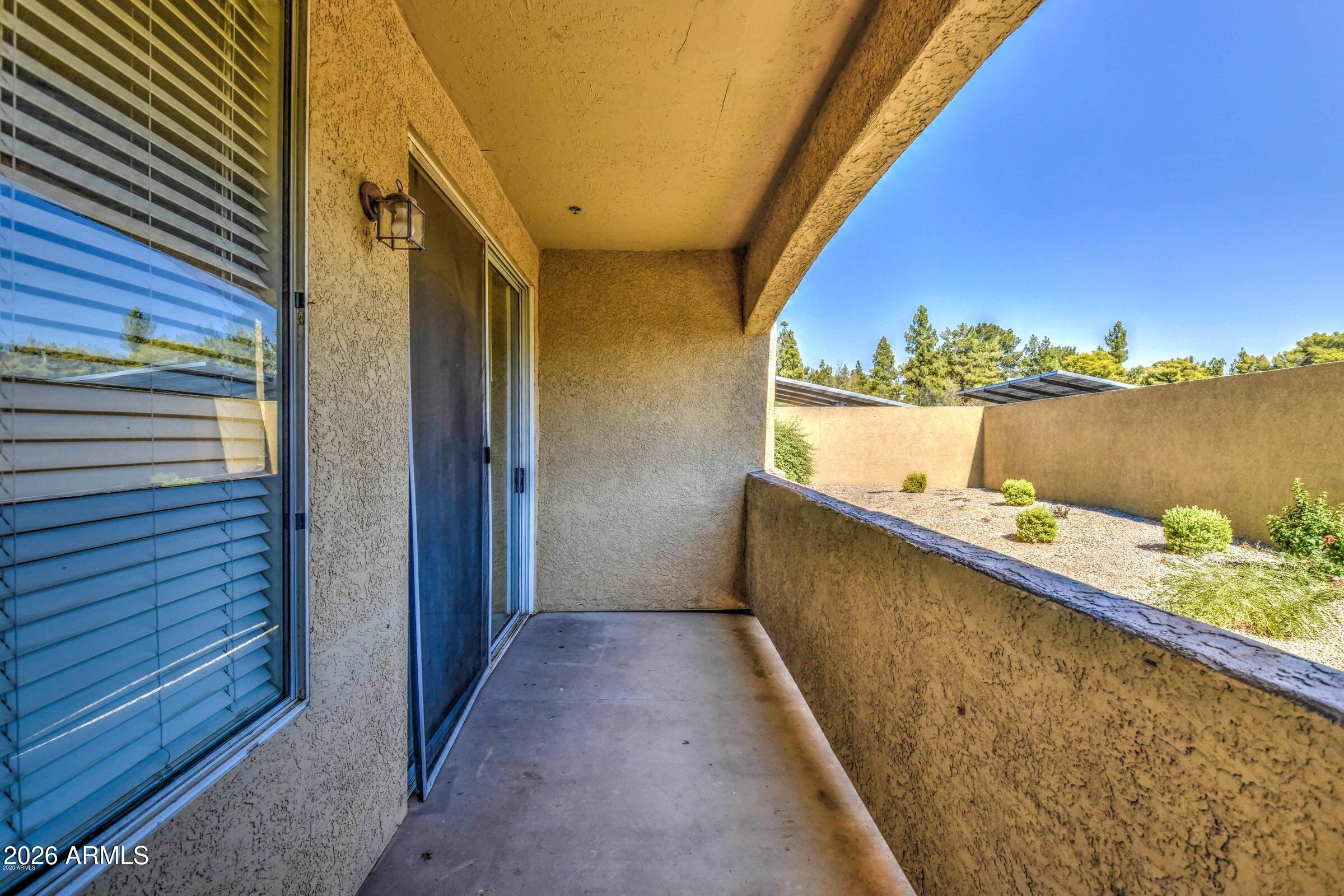 2134 East Broadway Road, Unit 1039 Tempe, AZ 85282 - Photo 9 of 24 a view of balcony with furniture