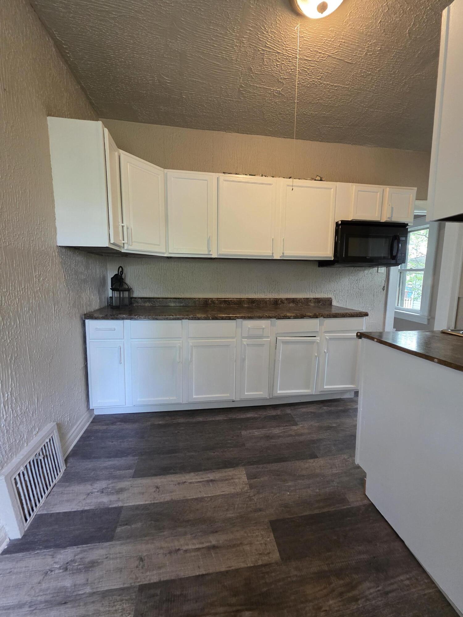 3946 Connecticut Street Gary, IN 46409 - Photo 13 of 20 a kitchen with a sink and cabinets