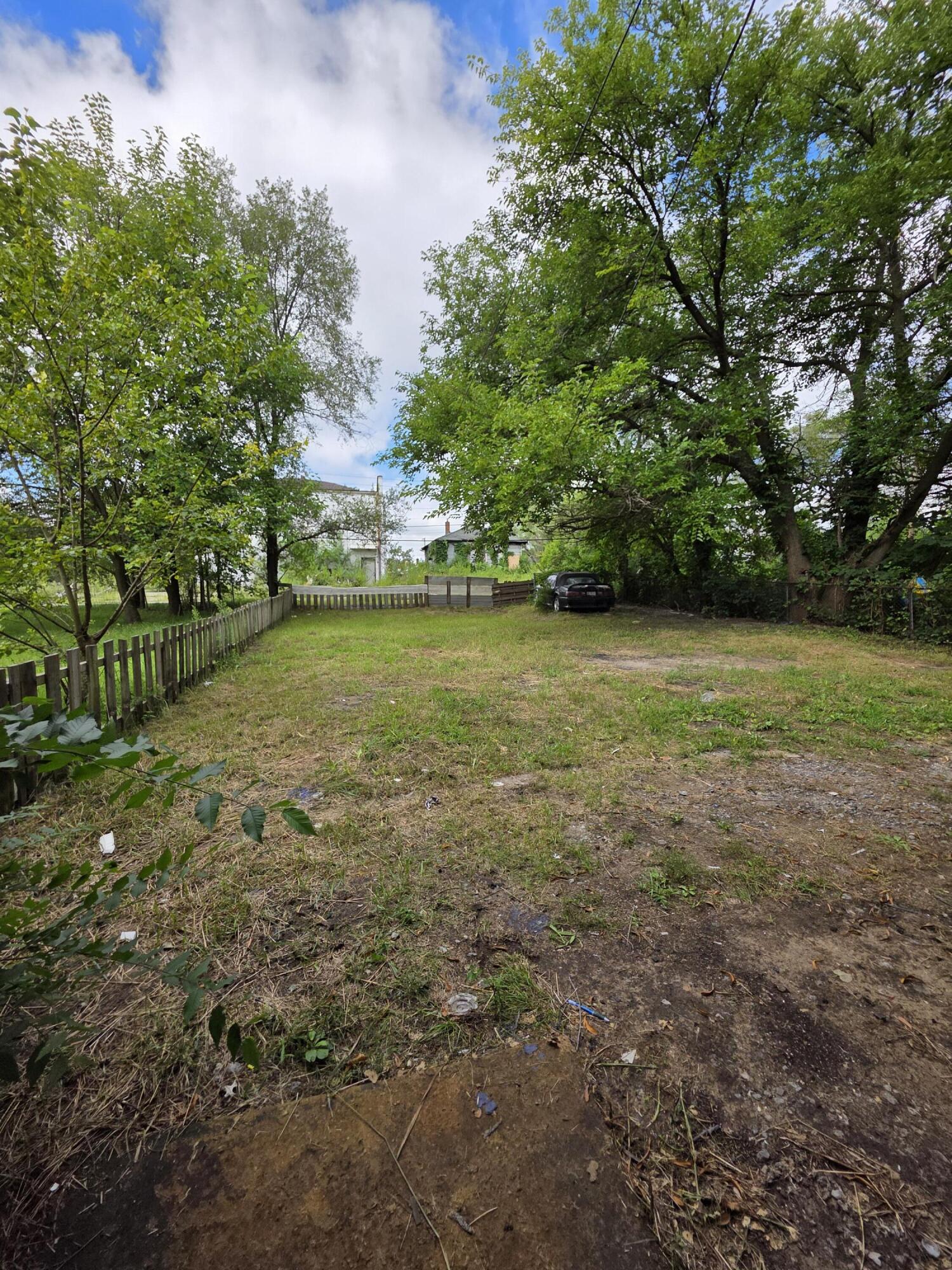 3946 Connecticut Street Gary, IN 46409 - Photo 18 of 20 a view of a field with an trees