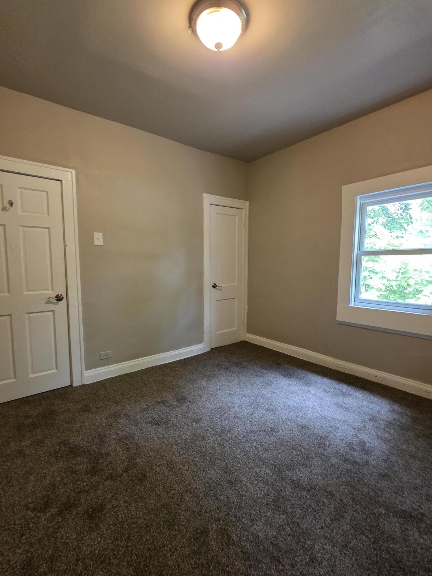 3946 Connecticut Street Gary, IN 46409 - Photo 7 of 20 an empty room with windows and closet