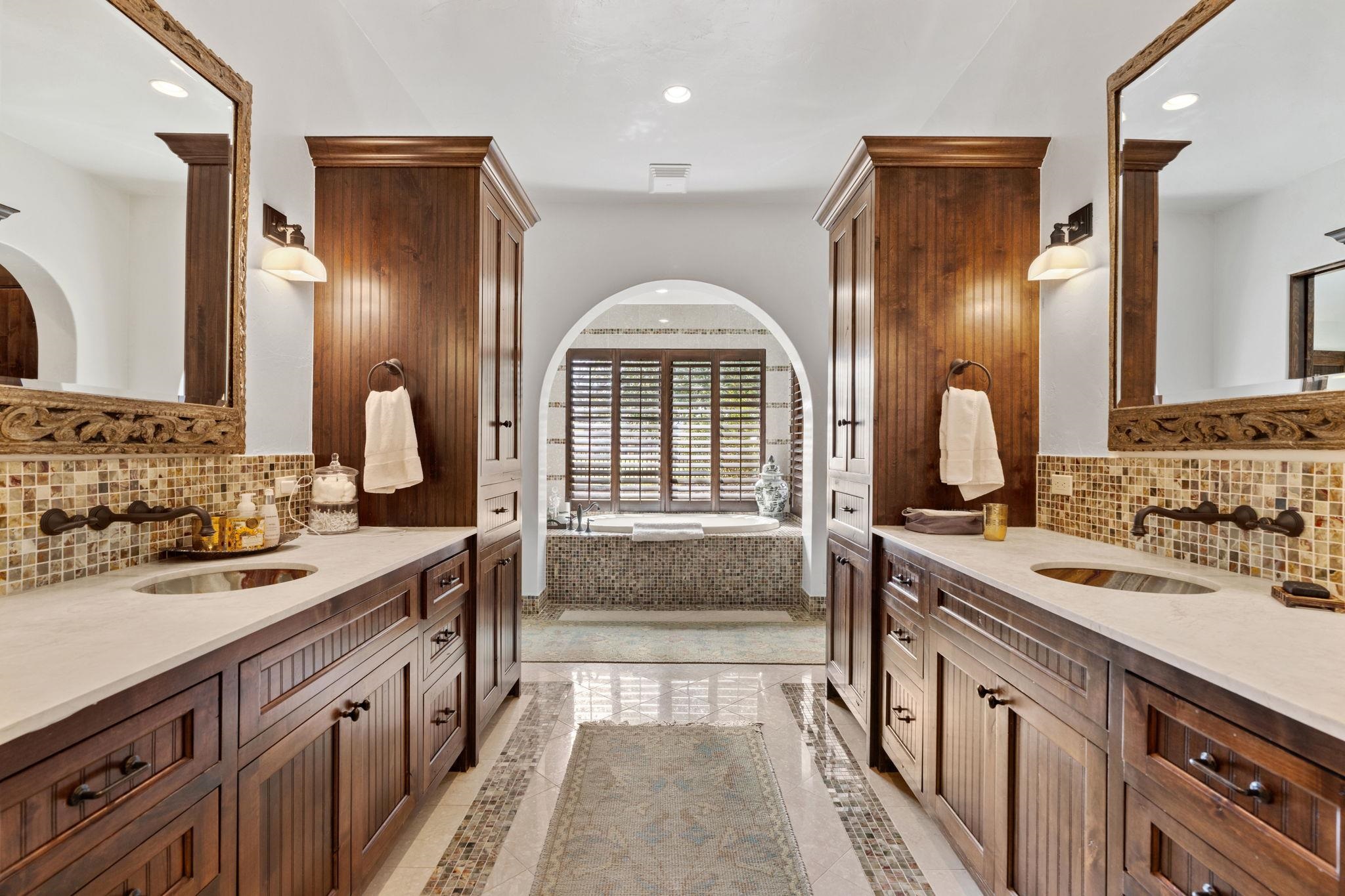 119 Plaza Escondido Horseshoe Bay, TX 78657 - Photo 14 of 30 a spacious bathroom with a sink double vanity