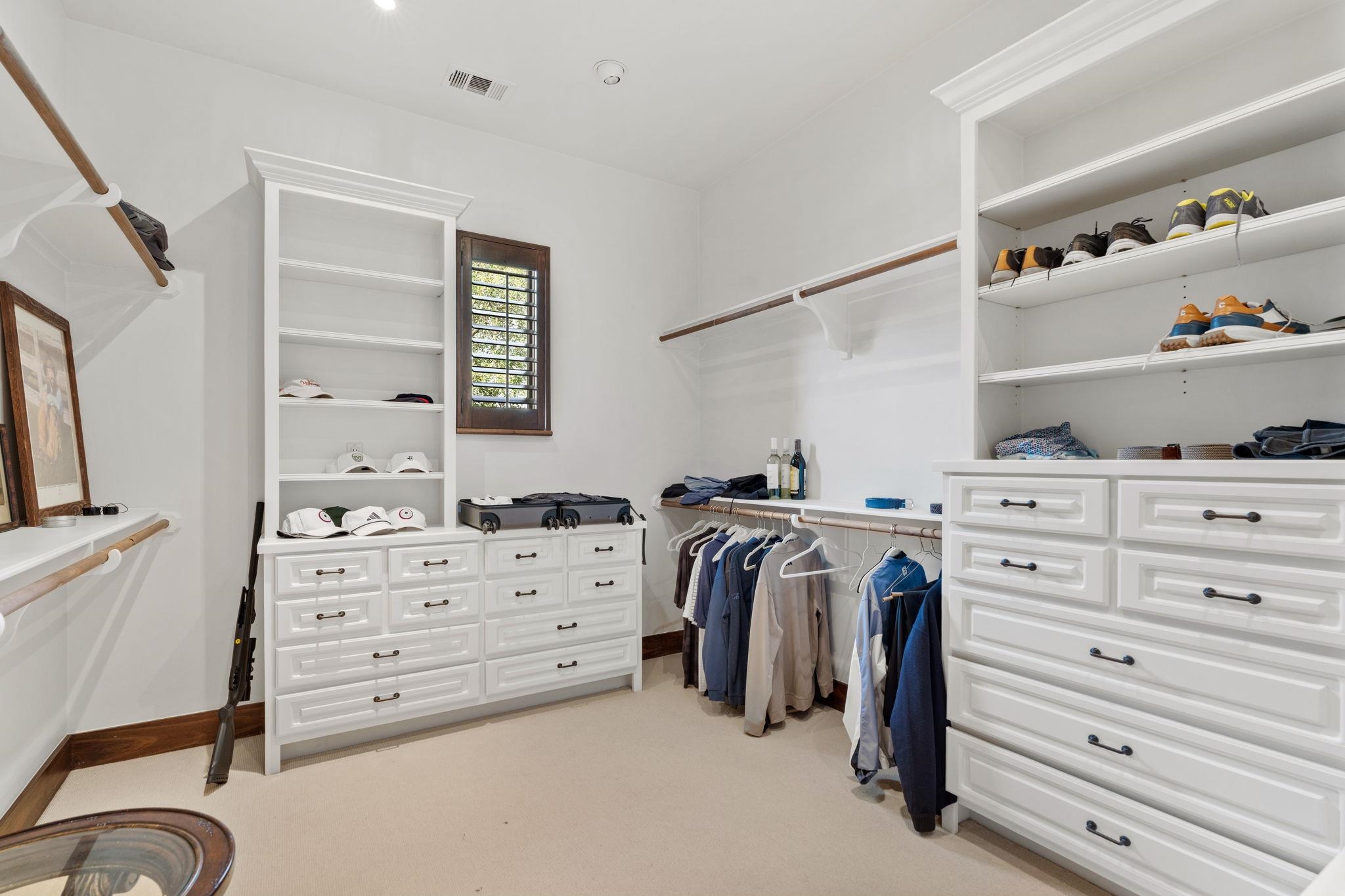 119 Plaza Escondido Horseshoe Bay, TX 78657 - Photo 15 of 30 a view of a dresser and storage