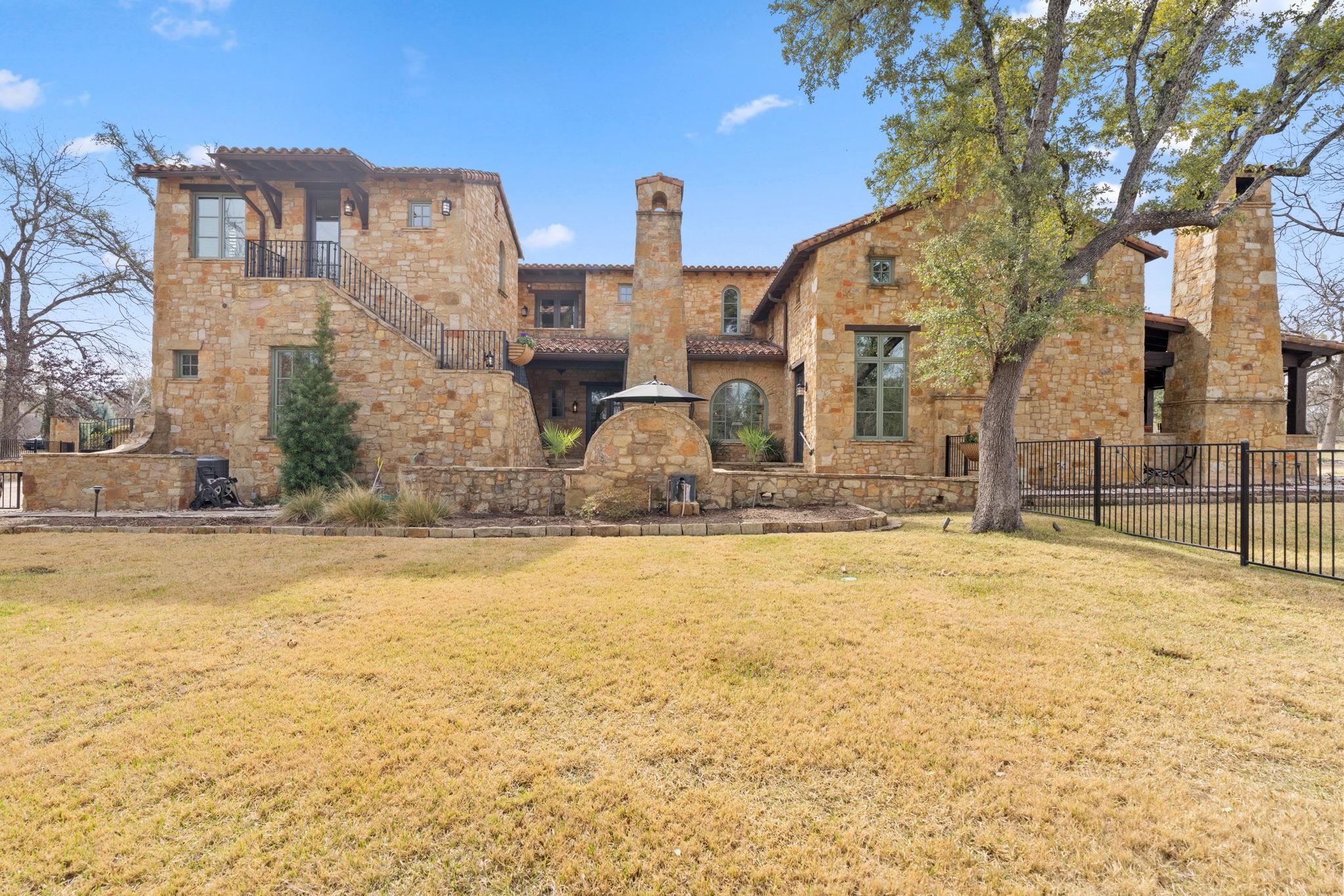119 Plaza Escondido Horseshoe Bay, TX 78657 - Photo 26 of 30 a view of a house with snow on the road