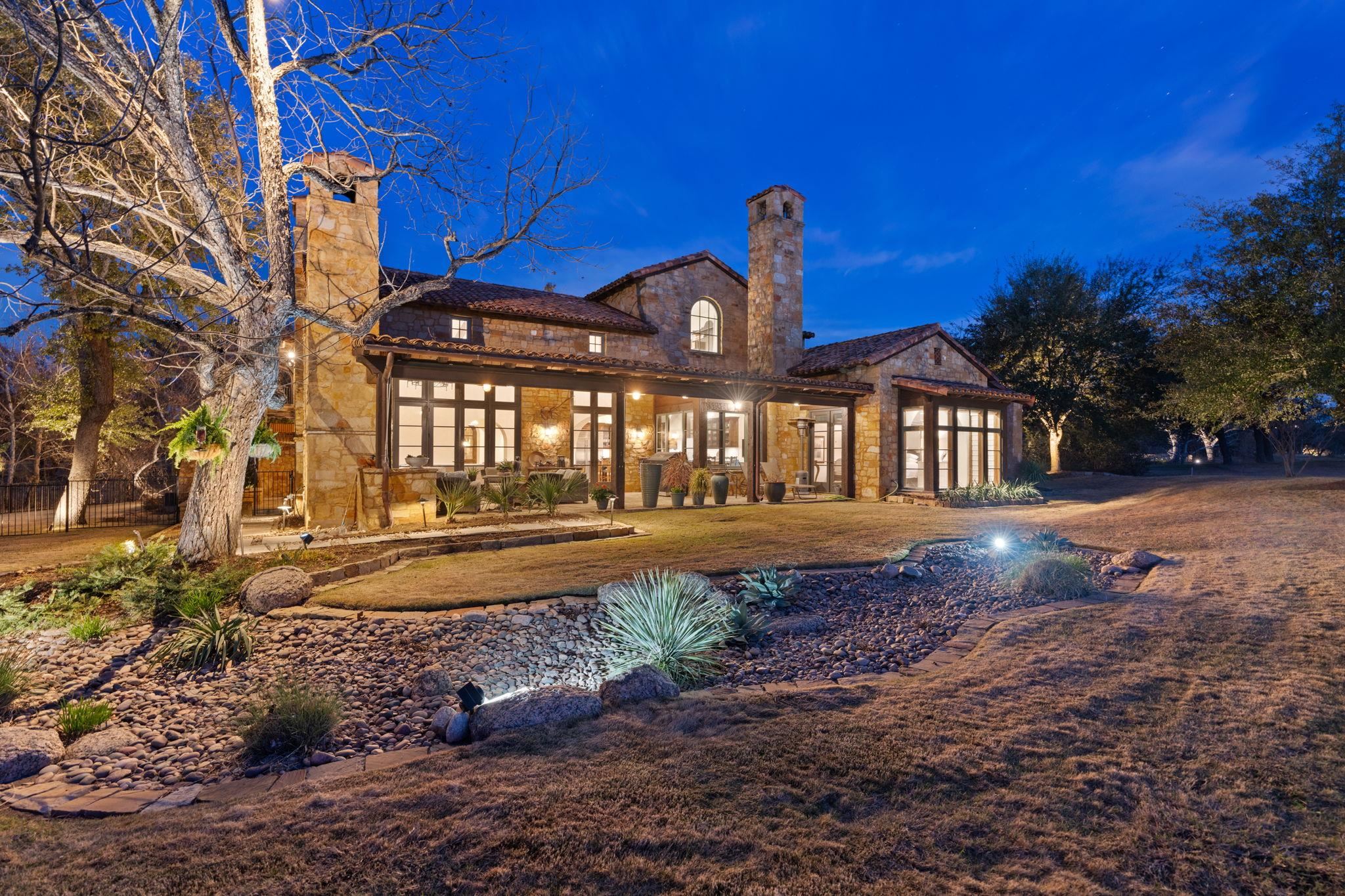 119 Plaza Escondido Horseshoe Bay, TX 78657 - Photo 27 of 30 a front view of a house with a yard