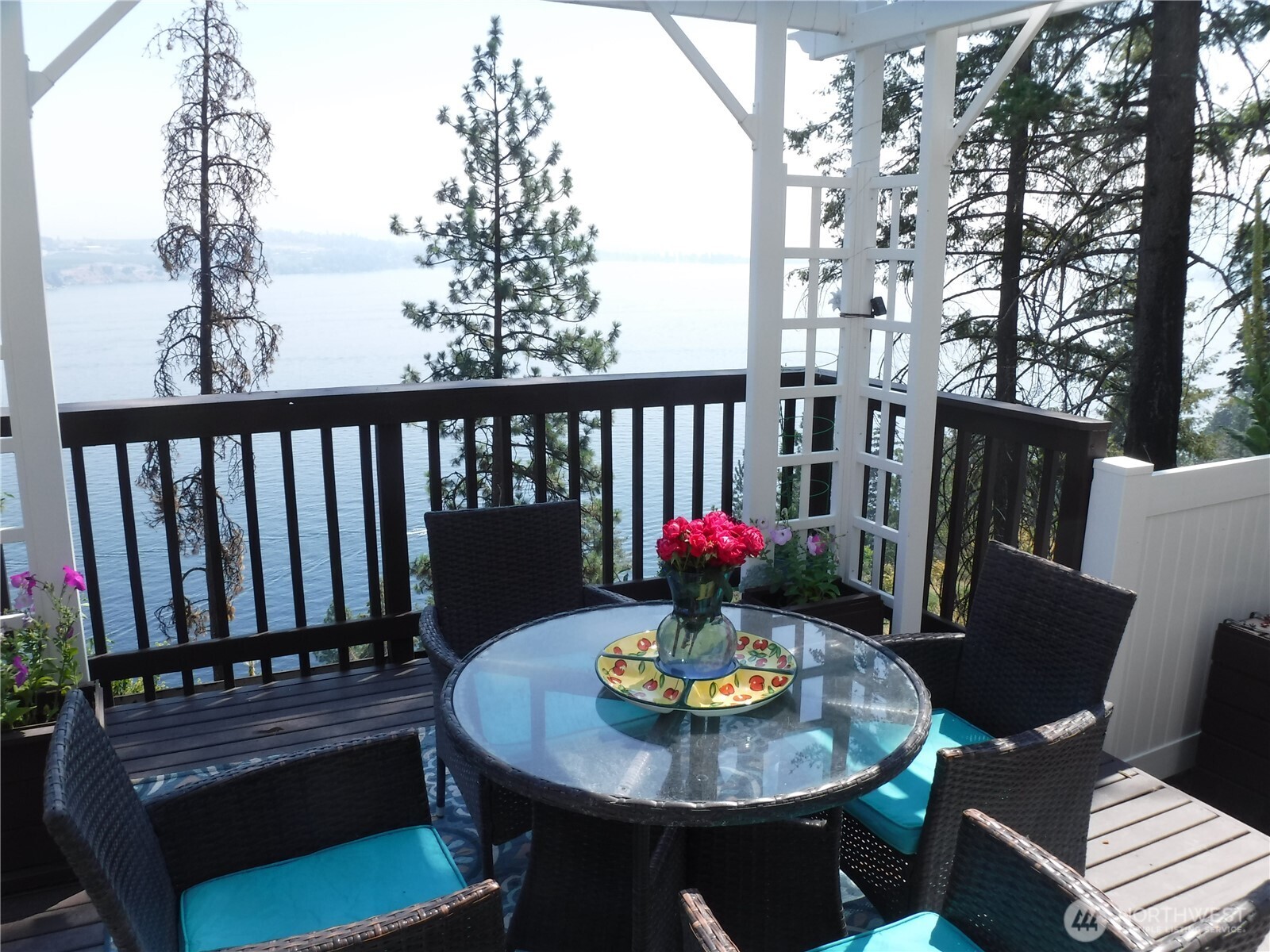 165 Granite Falls Road Chelan, WA 98816 - Photo 5 of 27 a view of a table and chairs in the patio