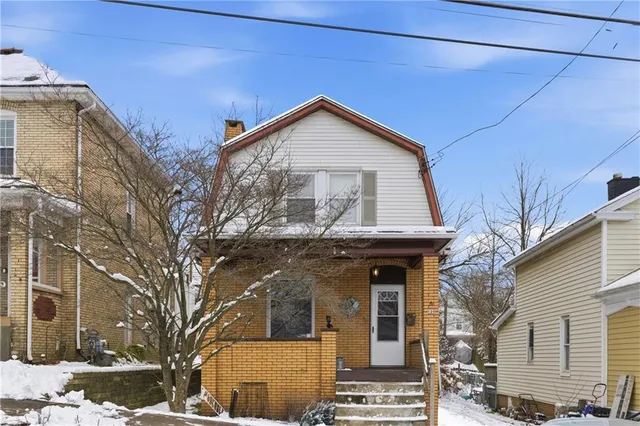 a view of a house with a garage