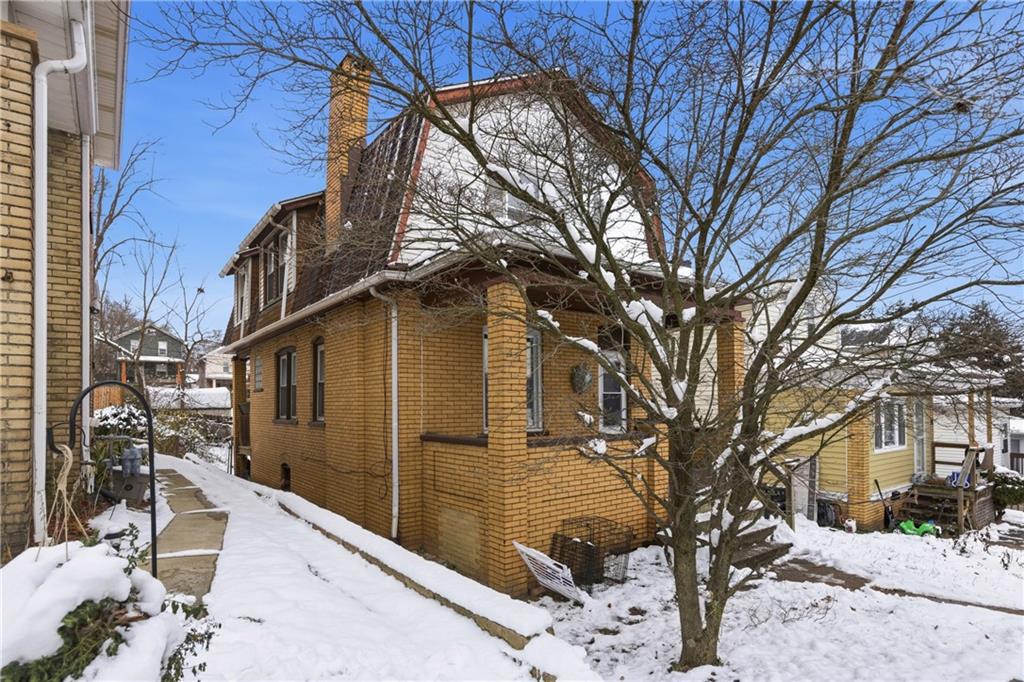 526 Dippold Avenue Baden, PA 15005 - Photo 3 of 26 a view of a building with a snow