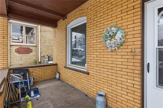 a view of front door of house with window