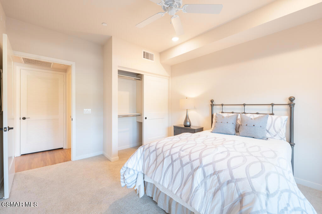 77 North Conejo School Road, Unit 208 Thousand Oaks, CA 91362 - Photo 12 of 27 a bedroom with a bed and a painting