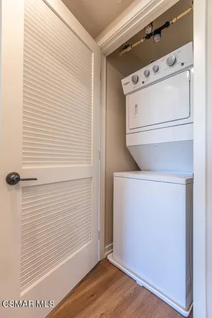 a view of a utility room with washer and dryer