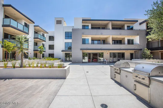 a front view of building with multiple yard