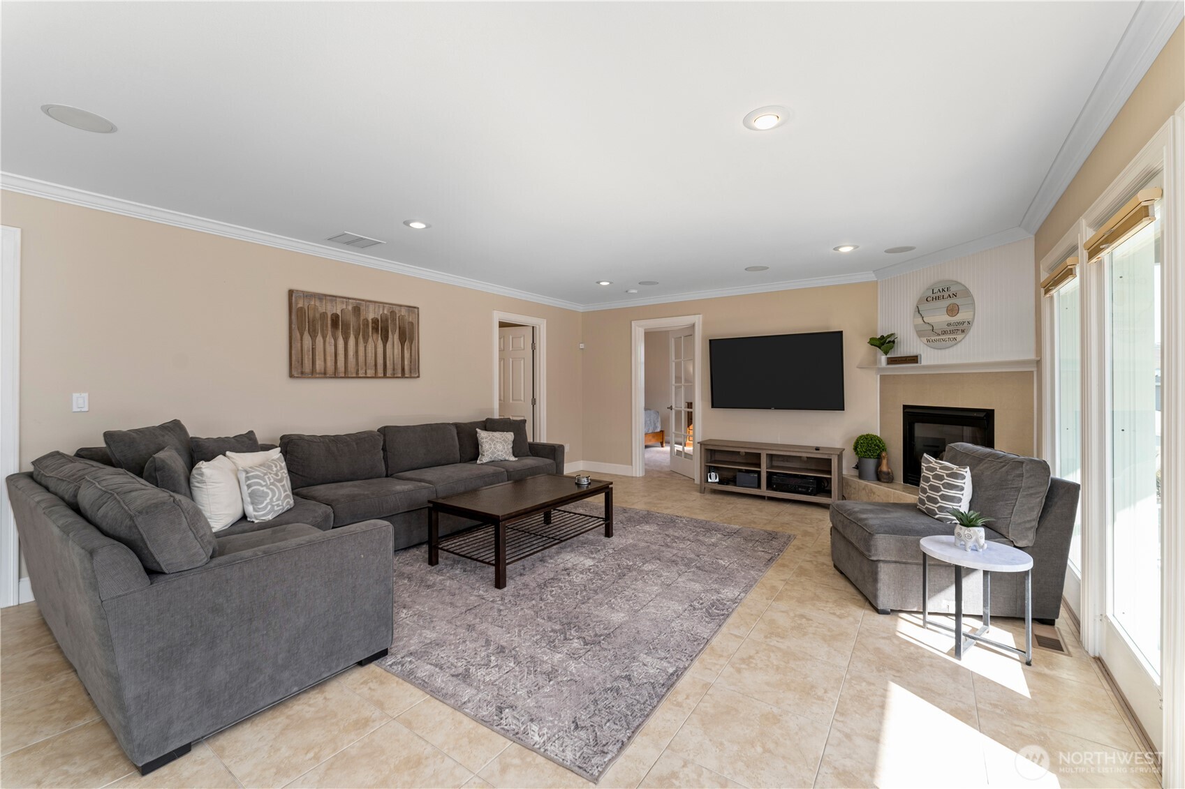 60 Wall Street Manson, WA 98831 - Photo 14 of 40 a living room with furniture and a flat screen tv