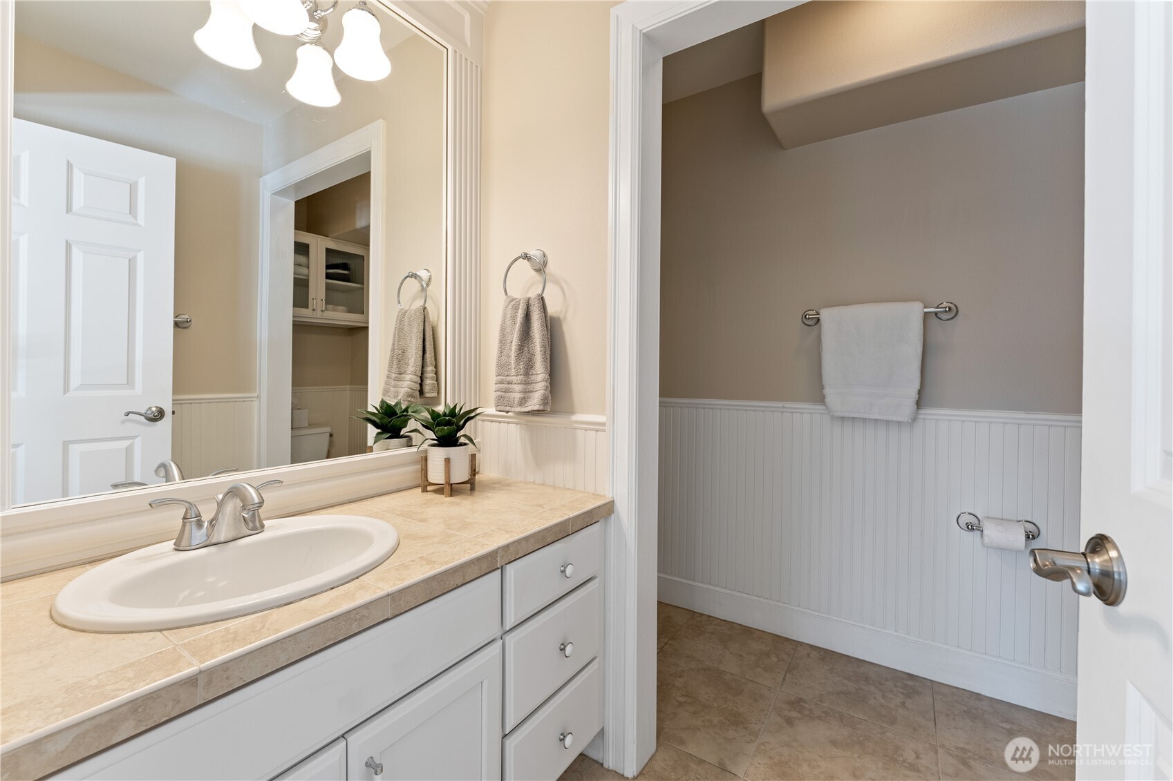 60 Wall Street Manson, WA 98831 - Photo 16 of 40 a bathroom with a sink and a mirror