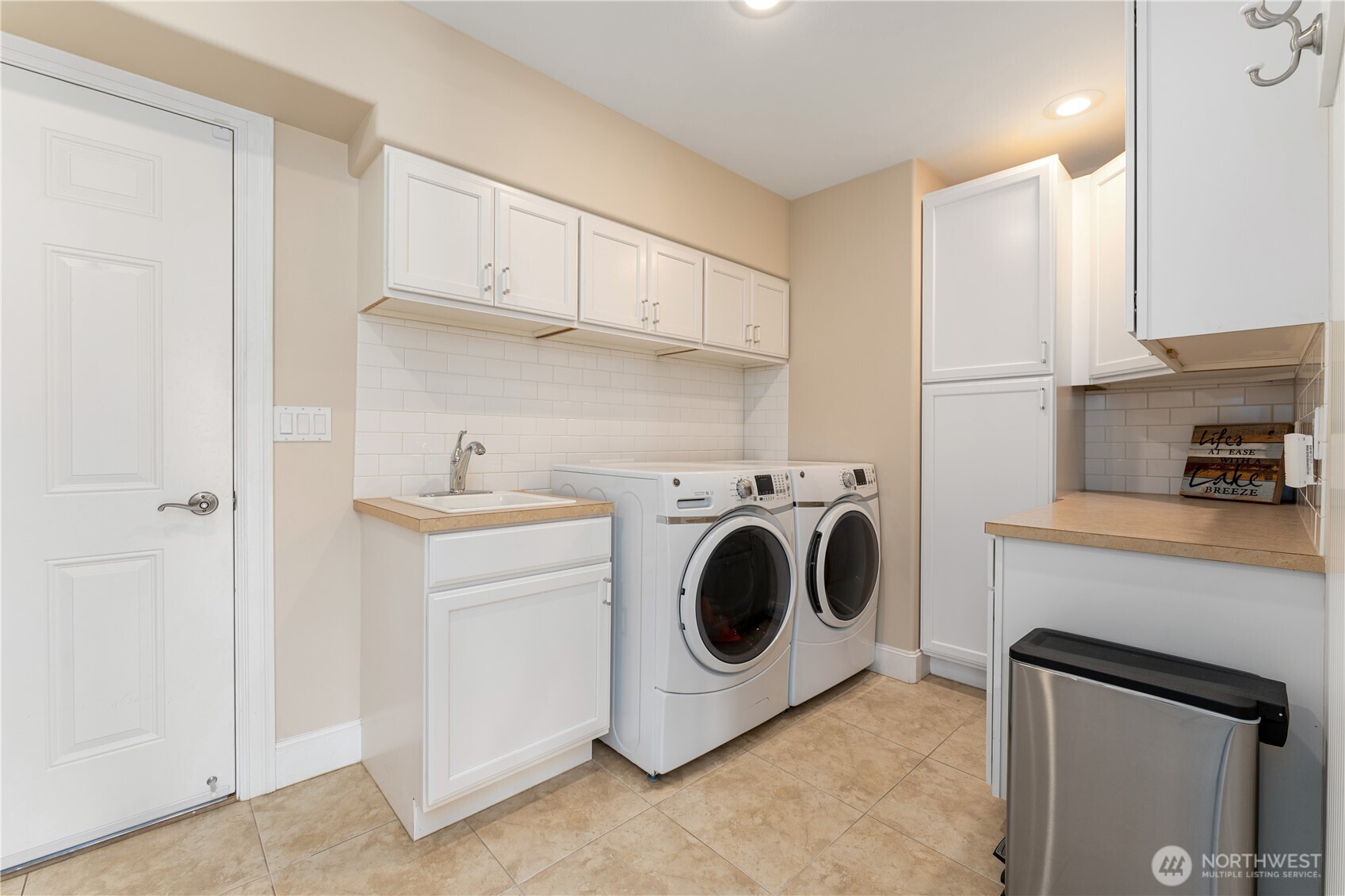 60 Wall Street Manson, WA 98831 - Photo 18 of 40 a utility room with sink dryer and washer