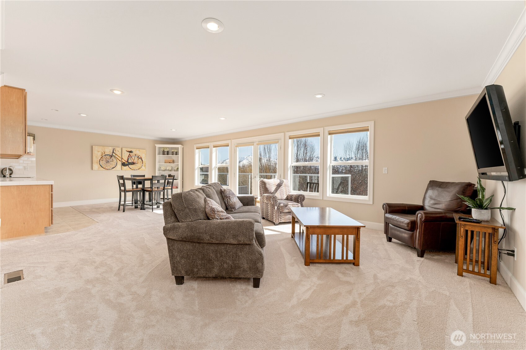 60 Wall Street Manson, WA 98831 - Photo 19 of 40 a living room with furniture and a flat screen tv
