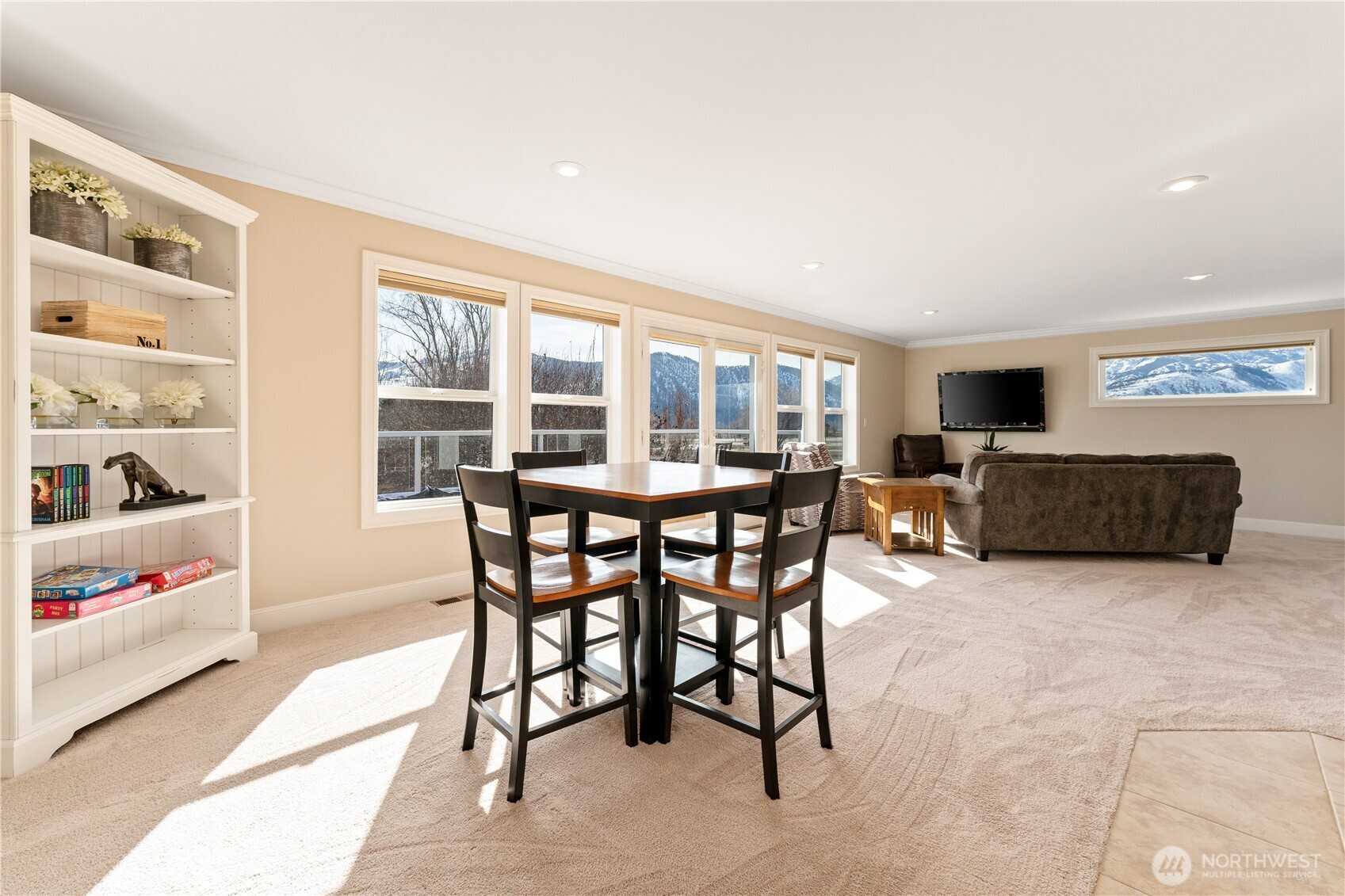 60 Wall Street Manson, WA 98831 - Photo 21 of 40 a living room with furniture and a flat screen tv