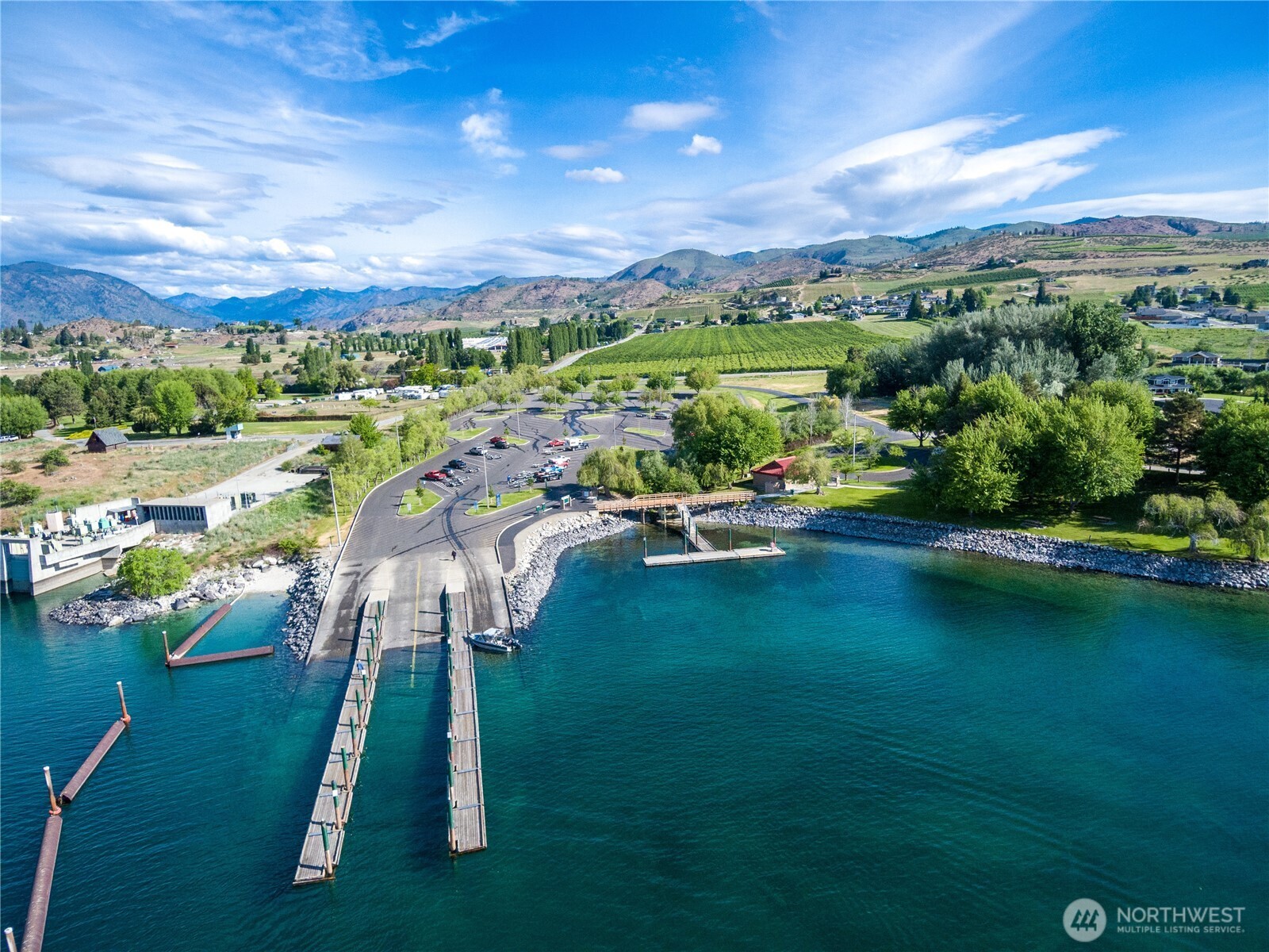 60 Wall Street Manson, WA 98831 - Photo 39 of 40 a view of a lake with a yard