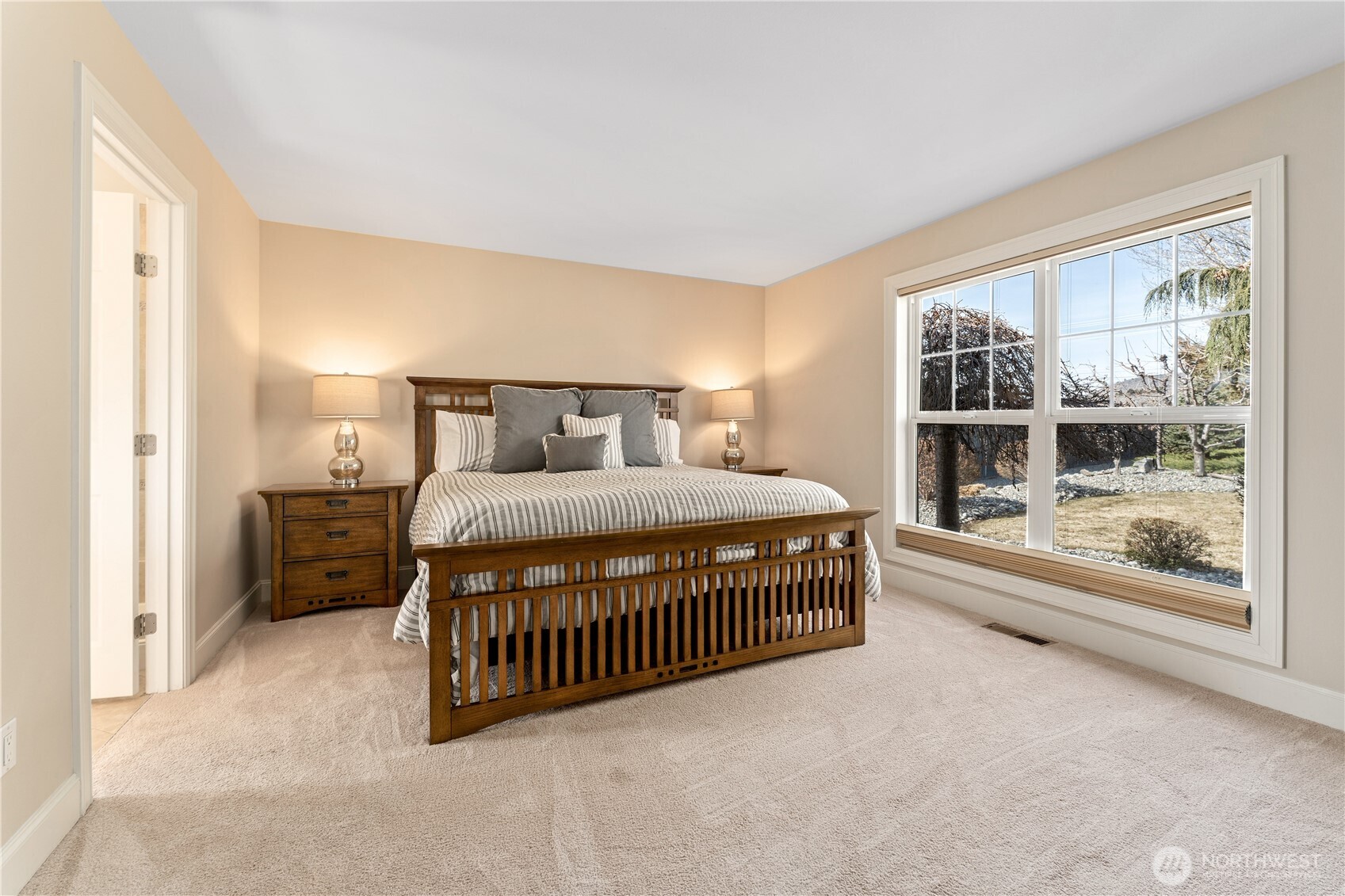 60 Wall Street Manson, WA 98831 - Photo 6 of 40 a bedroom with furniture and a window