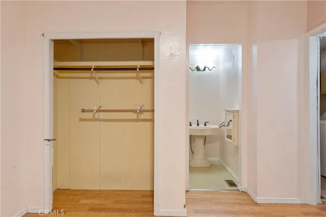 a bathroom with a glass shower door