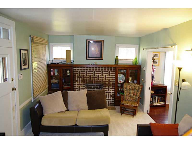 Living Room. Neutral Decor , Decorative Fireplace, Beautiful Built-ins.